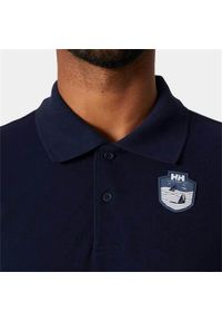 Koszulka sportowa męska Helly Hansen Marstrand Polo. Typ kołnierza: polo. Kolor: niebieski. Materiał: bawełna. Styl: sportowy