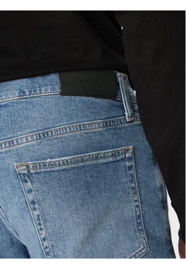 Calvin Klein Szorty jeansowe K10K114079 Niebieski Slim Fit. Kolor: niebieski. Materiał: bawełna
