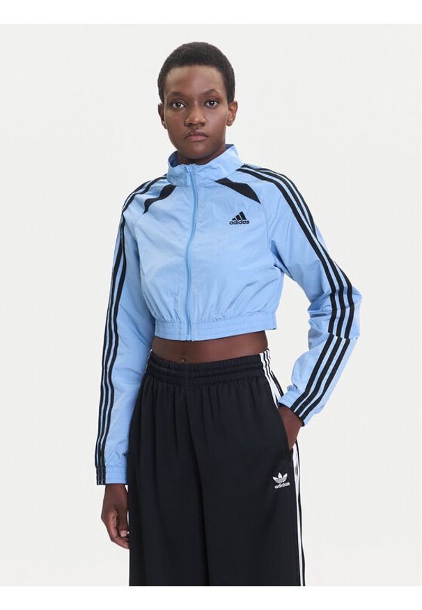 Adidas - adidas Bluza Teamgeist adicolor JZ8277 Błękitny Slim Fit. Kolor: niebieski. Materiał: syntetyk