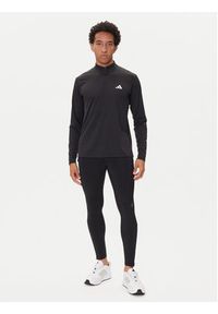 Adidas - adidas Legginsy Own The Run Winterized JN9597 Czarny Slim Fit. Kolor: czarny. Materiał: syntetyk. Sport: bieganie