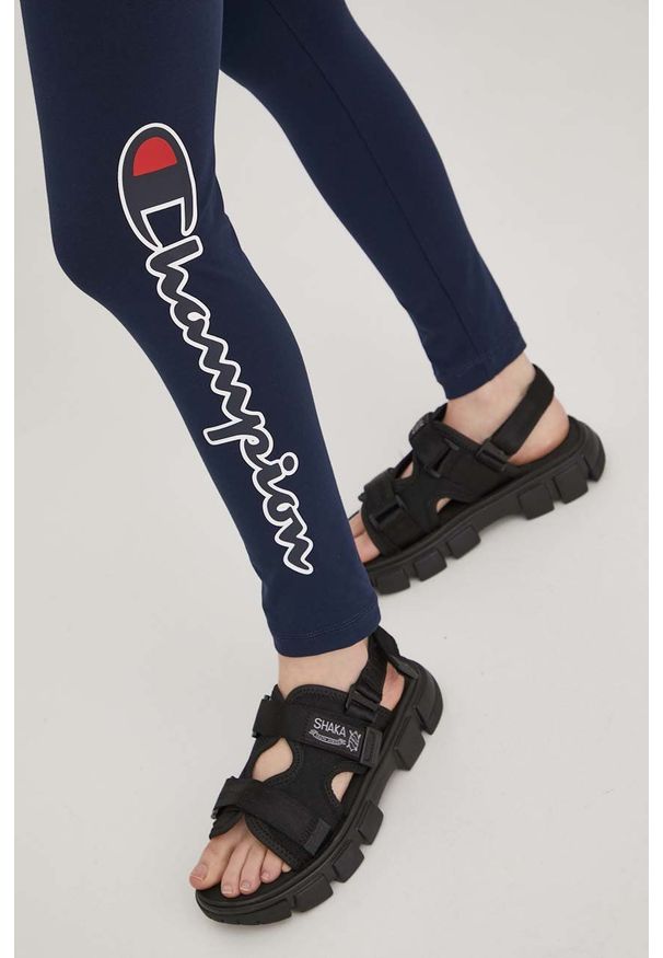 Champion legginsy damskie kolor granatowy z nadrukiem. Kolor: niebieski. Materiał: dzianina. Wzór: nadruk