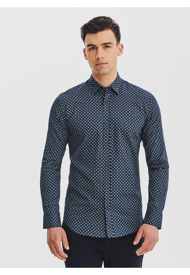 Pako Lorente - PAKO LORENTE - Granatowa koszula męska we wzór geometryczny. Kolor: niebieski. Materiał: bawełna. Długość rękawa: długi rękaw. Długość: długie. Wzór: geometria. Sezon: jesień