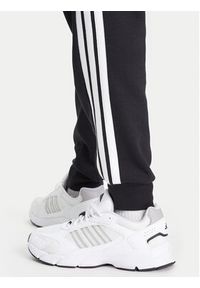 Adidas - adidas Spodnie dresowe Essentials 3-Stripes JD1861 Czarny Regular Fit. Kolor: czarny. Materiał: bawełna #3
