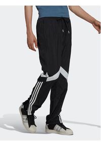 Adidas - adidas Spodnie dresowe Rekive HK7325 Czarny Regular Fit. Kolor: czarny. Materiał: syntetyk, dresówka #4