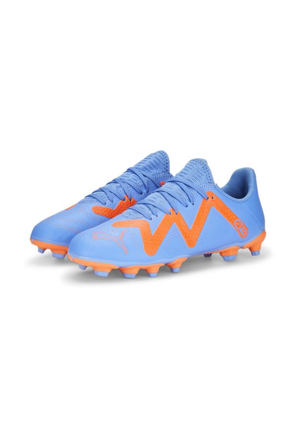 Buty piłkarskie dla dzieci Puma Future Play Fgag JR. Zapięcie: sznurówki. Kolor: wielokolorowy, pomarańczowy, żółty, biały, niebieski. Materiał: materiał, syntetyk. Szerokość cholewki: normalna. Sport: piłka nożna