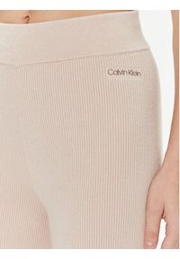 Calvin Klein Spodnie dzianinowe Essential K20K206023 Beżowy Wide Leg. Kolor: beżowy. Materiał: syntetyk