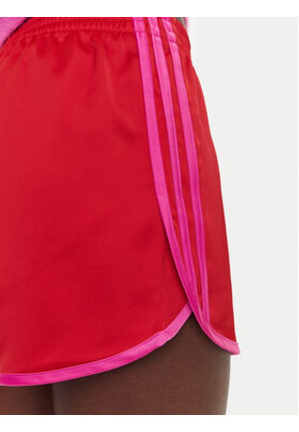 Adidas - adidas Szorty sportowe adicolor 3-Stripes Sprinter JZ3513 Czerwony Loose Fit. Kolor: czerwony. Materiał: syntetyk