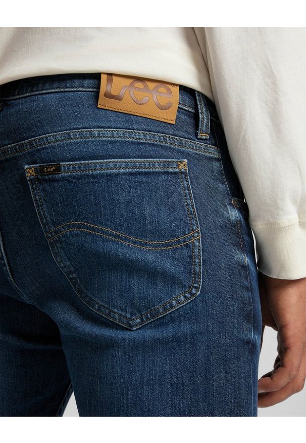 Lee - LEE RIDER MĘSKIE SPODNIE JEANSOWE SEA SALT WORN L701PXEI 112321982