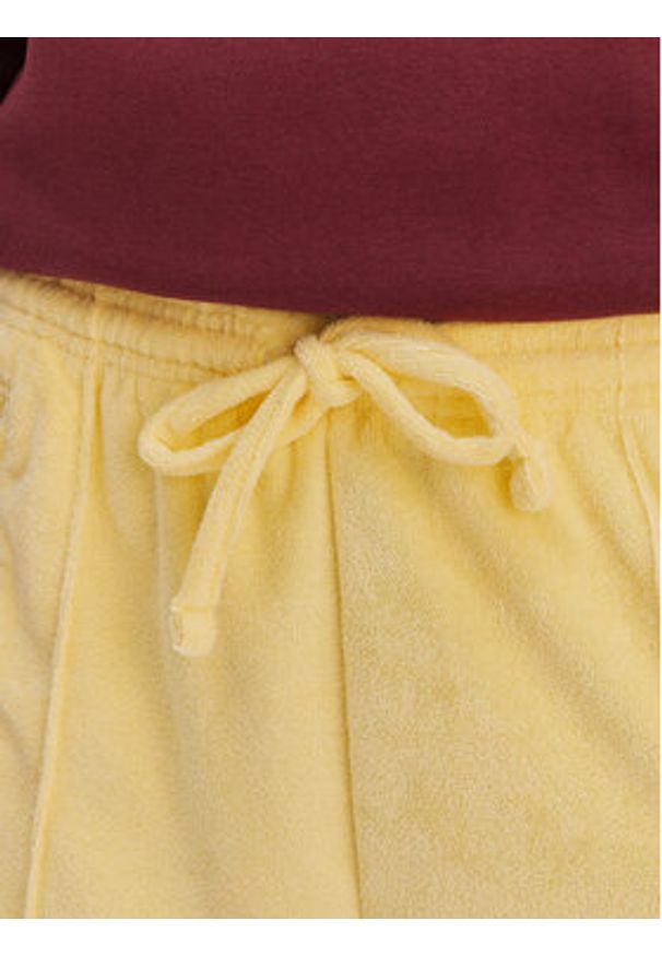 Adidas - adidas Spodnie dresowe Terry Towel Firebird KQ6662 Żółty Loose Fit. Kolor: żółty. Materiał: bawełna