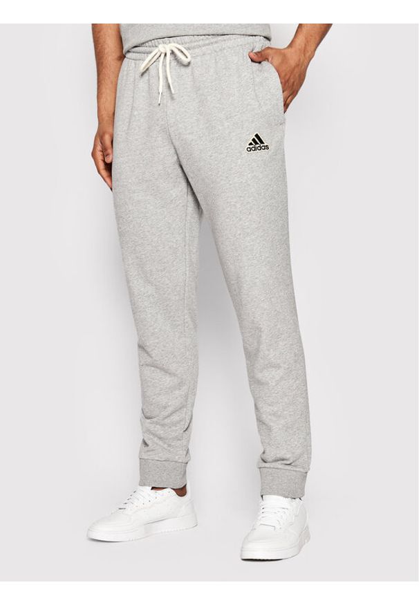 Adidas - adidas Spodnie dresowe Essentials Feel Comfy French Terry HE1857 Szary Regular Fit. Kolor: szary. Materiał: syntetyk