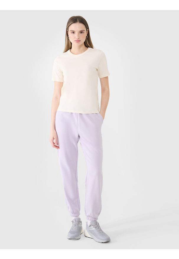 4f - 4F Spodnie dresowe joggery damskie - fioletowe XL. Kolor: fioletowy. Materiał: dresówka. Wzór: ze splotem, gładki
