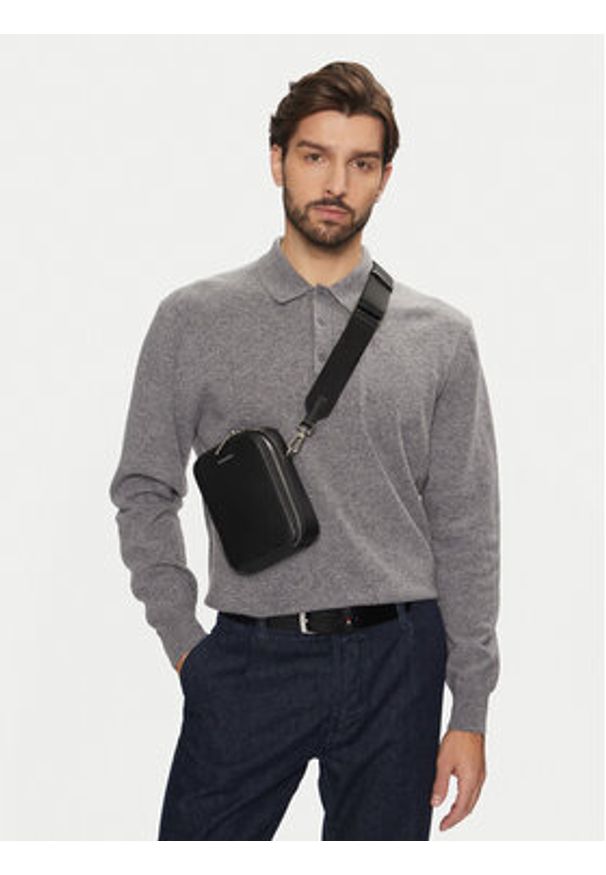 Calvin Klein Saszetka Ck Sleek Reporter Xs K50K512747 Czarny. Kolor: czarny. Materiał: skóra