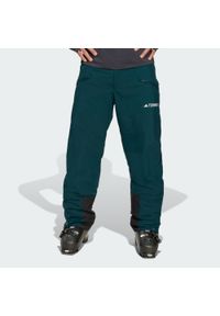Adidas - Ocieplane spodnie Terrex Multi 2 Layer CLIMAPROOF. Kolor: niebieski. Materiał: dresówka