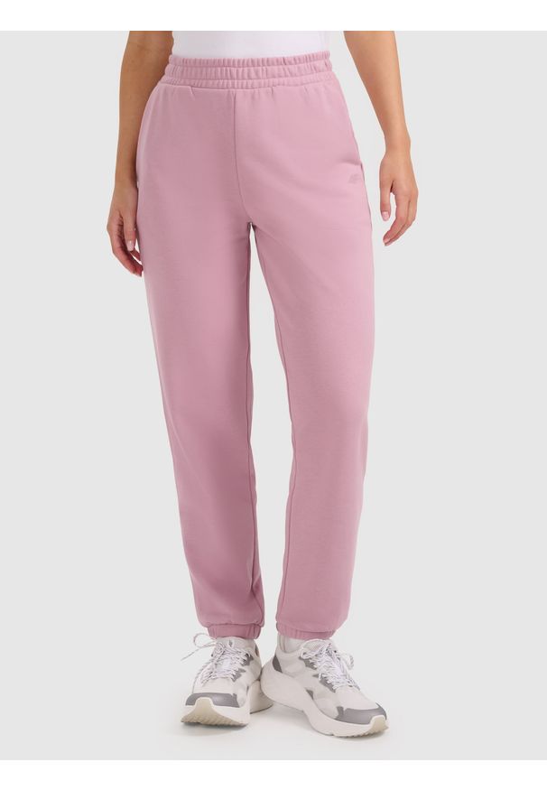 4f - 4F Spodnie dresowe joggery damskie - różowe XL. Kolor: różowy. Materiał: dresówka