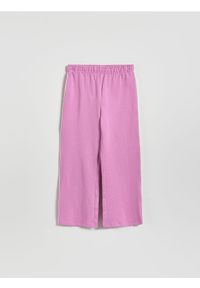 Reserved - Spodnie dresowe z lampasem - fioletowy. Kolor: fioletowy. Materiał: dresówka