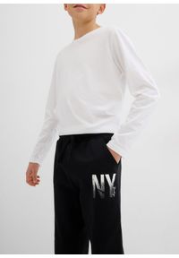 bonprix - Spodnie sportowe z miękkiej mieszanki bawełny. Kolor: czarny. Materiał: bawełna. Wzór: nadruk. Styl: sportowy #2