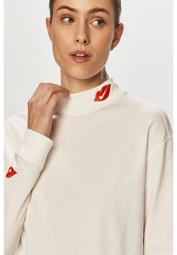 Nike Sportswear - Longsleeve. Kolor: biały. Materiał: dzianina. Długość rękawa: długi rękaw. Wzór: nadruk