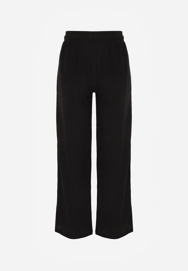 Born2be - Czarne Szerokie Spodnie z Teksturalnej Tkaniny z Wiązaniem w Pasie Agatia. Okazja: do pracy, na co dzień, na spacer. Stan: podwyższony. Kolor: czarny. Materiał: tkanina. Długość: długie. Styl: wakacyjny, casual