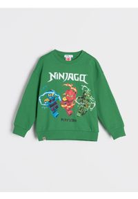 Sinsay - Bluza Ninjago - zielony. Kolor: zielony. Długość rękawa: długi rękaw. Długość: długie. Wzór: nadruk