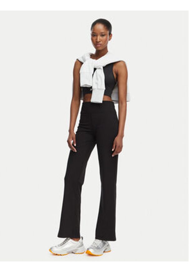 Calvin Klein Performance Legginsy LVGWS6L644 Czarny Flared Leg. Kolor: czarny. Materiał: syntetyk