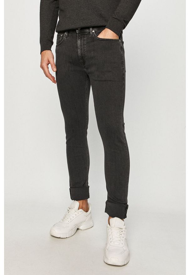 Calvin Klein Jeans - Jeansy CKJ016. Kolor: czarny. Materiał: bawełna, denim, elastan. Wzór: gładki