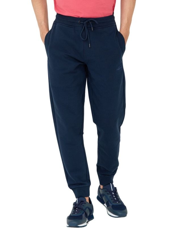 Aeronautica Militare - AERONAUTICA MILITARE Granatowe męskie spodnie dresowe. Kolor: niebieski. Materiał: dresówka