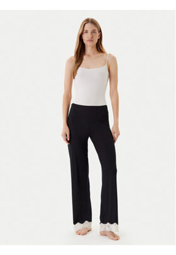 United Colors of Benetton - United Colors Of Benetton Spodnie piżamowe 3Z123F04A Czarny Regular Fit. Kolor: czarny. Materiał: wiskoza