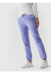 4f - Spodnie dresowe joggery damskie - niebieskie. Kolor: niebieski. Materiał: dresówka