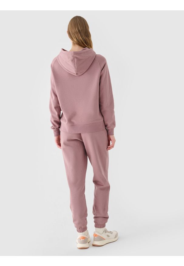 4f - 4F Spodnie dresowe joggery damskie - różowe M. Kolor: różowy. Materiał: dresówka. Wzór: ze splotem, gładki