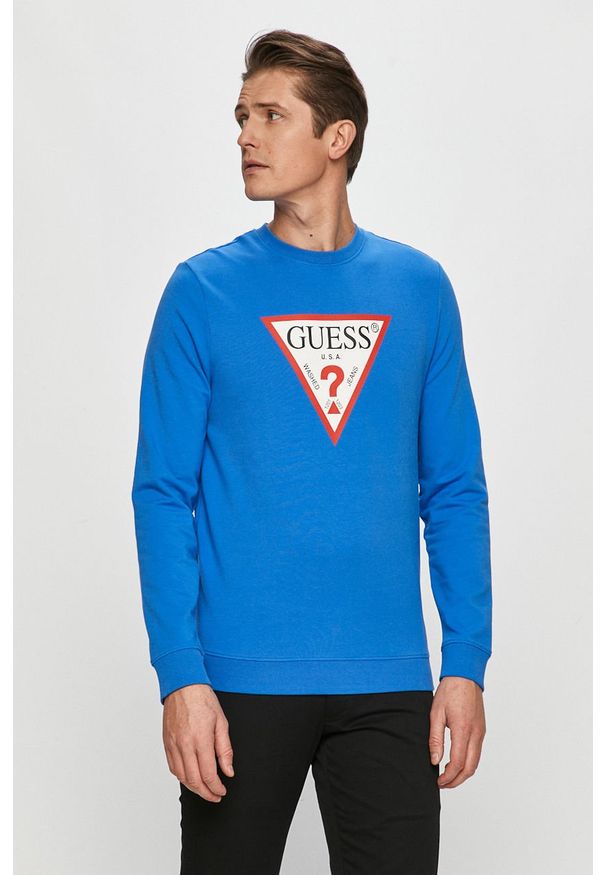 Guess - Bluza. Okazja: na co dzień. Typ kołnierza: bez kaptura. Kolor: niebieski. Materiał: bawełna, dzianina, elastan. Wzór: nadruk. Styl: casual