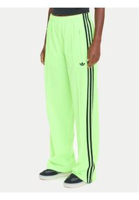 Adidas - adidas Spodnie dresowe adicolor Classic Firebird JW1228 Zielony Loose Fit. Kolor: zielony. Materiał: syntetyk