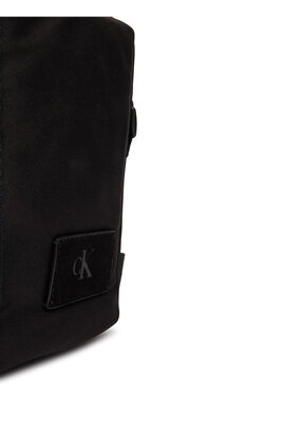 Calvin Klein Saszetka Canvas Mix Reporter LV04D3366G Czarny. Kolor: czarny. Materiał: materiał