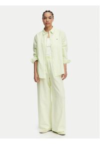 Tommy Jeans Spodnie materiałowe DW0DW22285 Zielony jasny Loose Fit. Kolor: zielony. Materiał: len #3