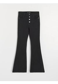 Sinsay - Spodnie jeansowe flare - czarny. Kolor: czarny