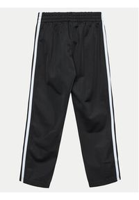 Adidas - adidas Spodnie dresowe Firebird IY9805 Czarny Regular Fit. Kolor: czarny. Materiał: syntetyk #2