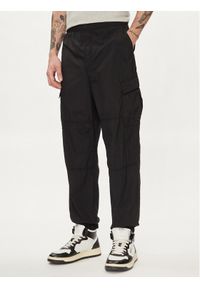 GAP - Gap Spodnie materiałowe 487058-00 Czarny Relaxed Fit. Kolor: czarny. Materiał: syntetyk #1