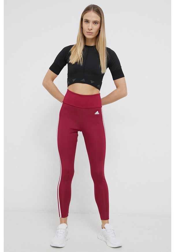 Adidas - adidas Legginsy damskie kolor fioletowy gładkie. Kolor: fioletowy. Materiał: dzianina, materiał. Wzór: gładki