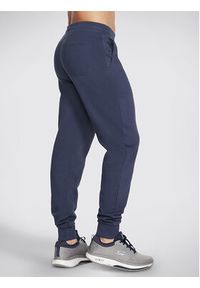 skechers - Skechers Spodnie dresowe Sweats Essential Jogger PT16 Szary Regular Fit. Kolor: szary. Materiał: bawełna, dresówka