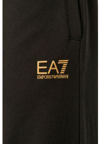 EA7 Emporio Armani - Spodnie. Kolor: czarny. Materiał: dzianina