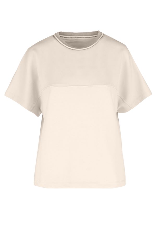 Volcano - Luźna bluzka z modalem TM-FINA. Okazja: na co dzień. Materiał: poliester, elastan, skóra, materiał. Długość rękawa: krótki rękaw. Długość: krótkie. Wzór: gładki. Styl: casual, klasyczny, sportowy