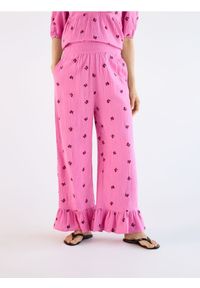 Reserved - Luźne spodnie z falbankami - różowy. Kolor: różowy. Materiał: bawełna #1