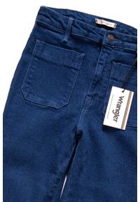 Wrangler - DAMSKIE SPODNIE JEANSOWE WRANGLER FLARE RINSEWASH W23361023. Stan: podwyższony. Wzór: jednolity. Styl: vintage #5