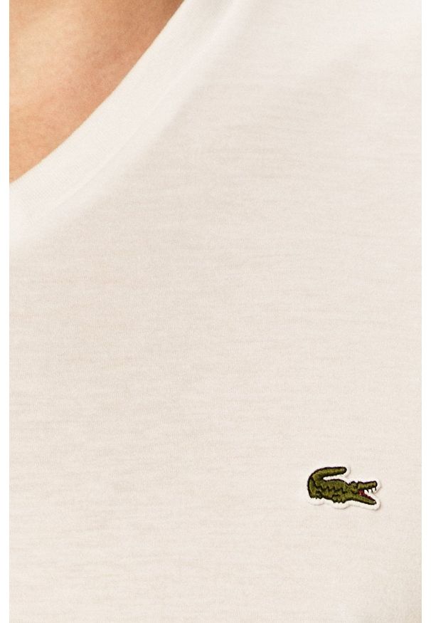 Lacoste - T-shirt. Okazja: na co dzień. Kolor: biały. Materiał: dzianina. Wzór: gładki. Styl: casual