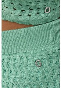 Guess spodnie damskie kolor zielony szerokie high waist. Stan: podwyższony. Kolor: zielony. Materiał: materiał #4