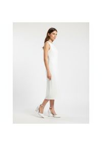 Czółenka damskie Marco Tozzi, ze skóry naturalnej na stabilnym słupku zapewniającym wygodę z paskiem wokół kostki poprawiającym dopasowanie i stabiln. Okazja: na ślub cywilny, na wesele, na imprezę. Zapięcie: pasek. Kolor: biały. Szerokość cholewki: normalna. Materiał: skóra. Sezon: lato. Obcas: na słupku. Styl: elegancki. Wysokość obcasa: średni #7