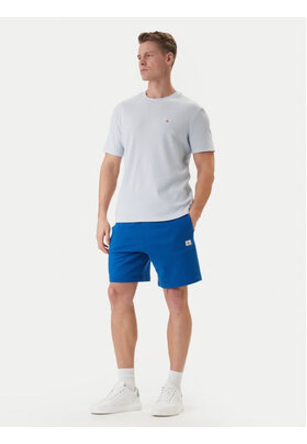 Calvin Klein Jeans Szorty sportowe LV04RF282G Niebieski Regular Fit. Kolor: niebieski. Materiał: bawełna. Styl: sportowy