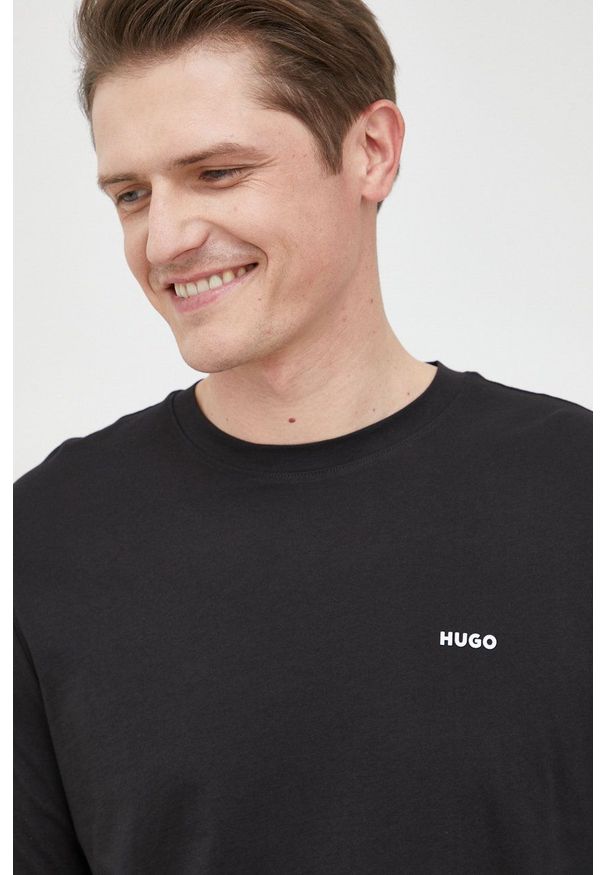 Hugo longsleeve bawełniany kolor czarny z nadrukiem. Kolor: czarny. Materiał: bawełna. Długość rękawa: długi rękaw. Wzór: nadruk