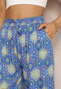 Renee - Niebieskie Spodnie z Wiskozowej Tkaniny w Ornamentalny Wzór Sishall. Kolor: niebieski. Materiał: tkanina, wiskoza. Styl: boho