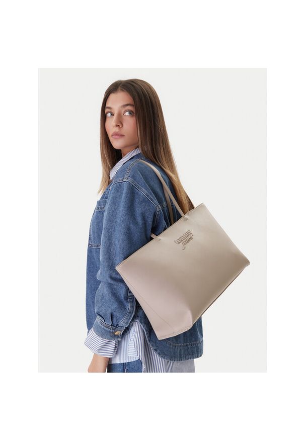 Torebka Tommy Jeans. Kolor: beżowy