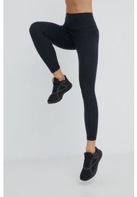 Adidas - adidas legginsy treningowe Yoga Essentials damskie kolor czarny gładkie. Kolor: czarny. Materiał: skóra, dzianina, materiał. Wzór: gładki. Sport: fitness